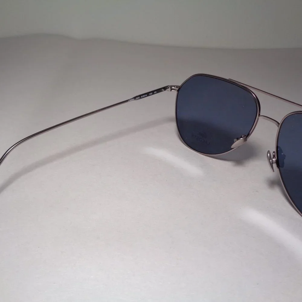 Lacoste l209s silver