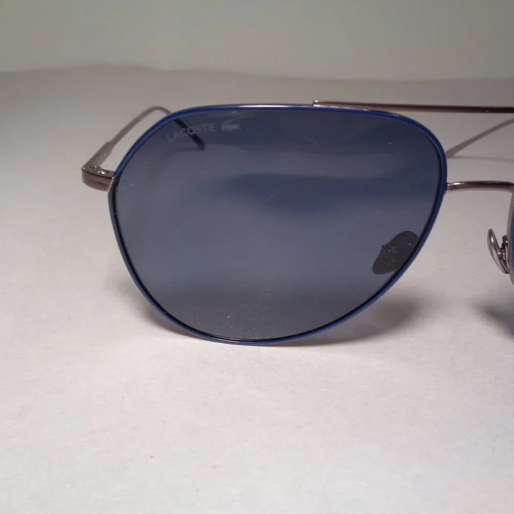 Lacoste l209s silver