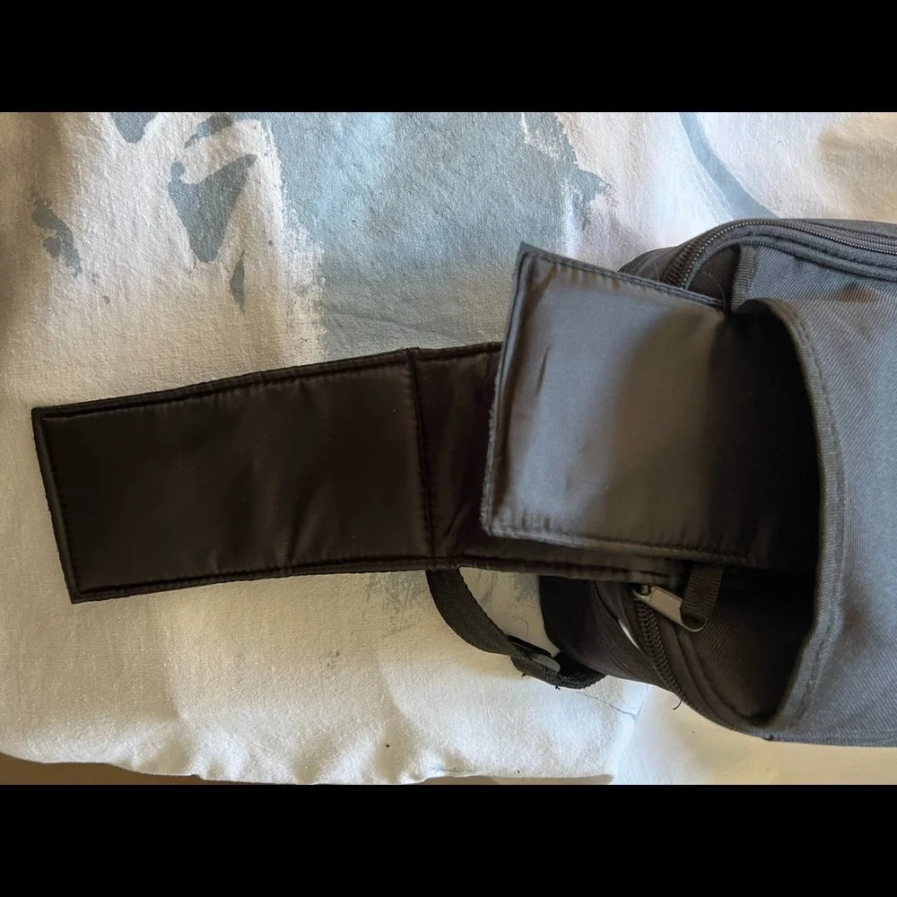 N/A adjusts crossbody gently