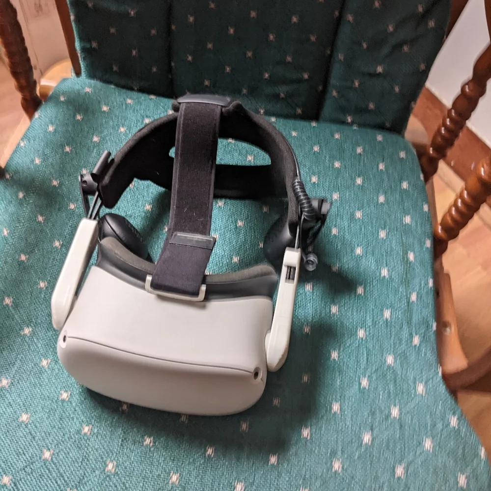Oculus Quest 2 with added modified headpiece, remotes, and charger