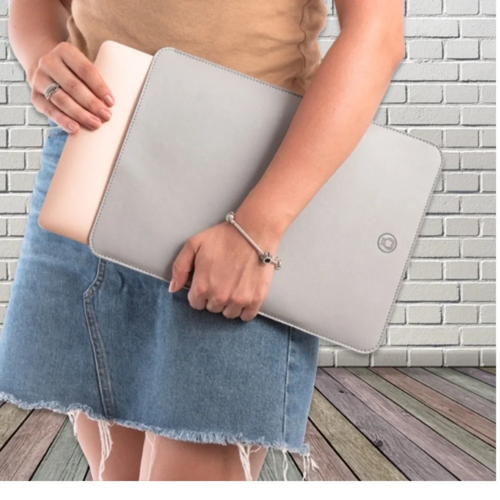 New Unika MacBook Laptop “13 sleeve in metallic rose gold.