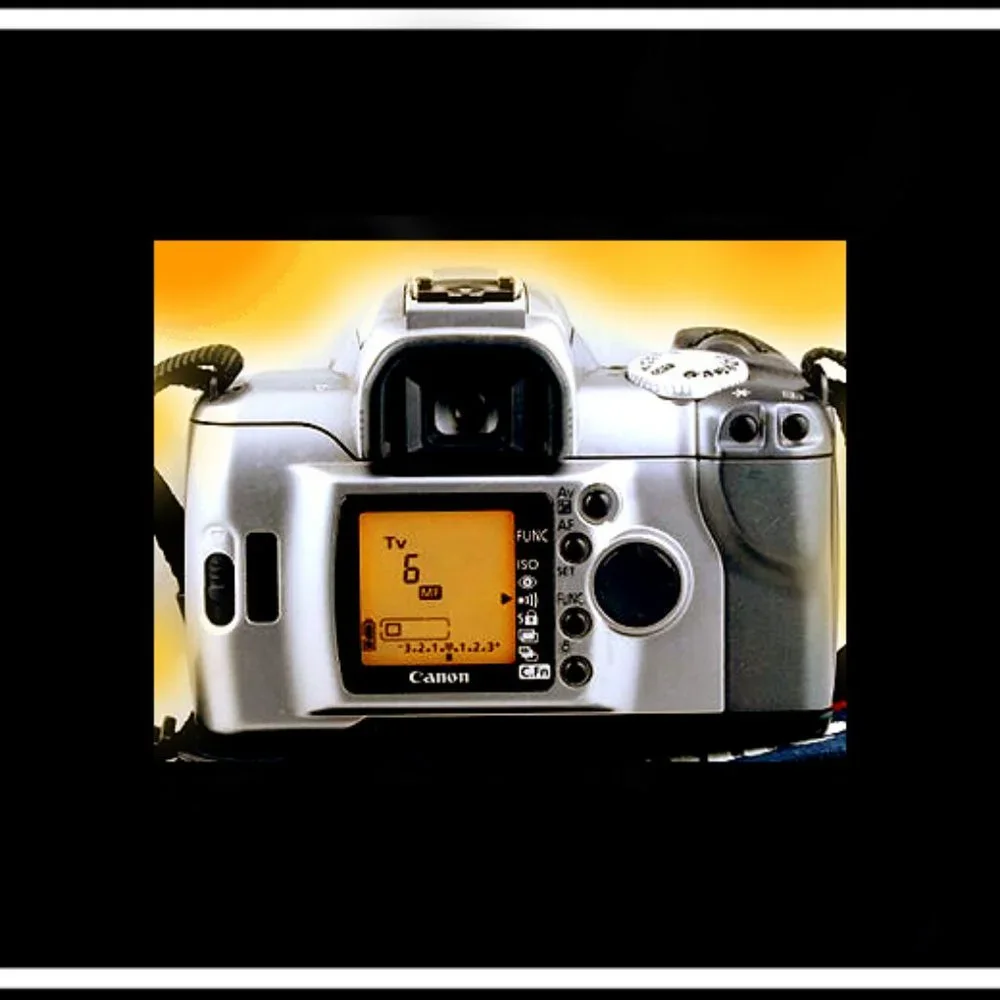 Canon Rebel EOS T2 Photography Camera With An Original Canon Camera Strap