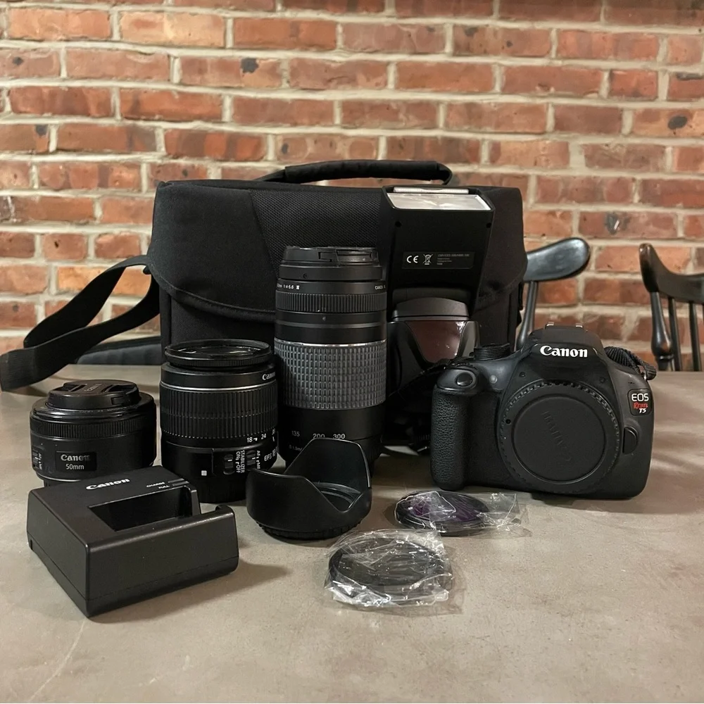 Canon EOS Rebel T5 with 3 lenses, external flash, and more