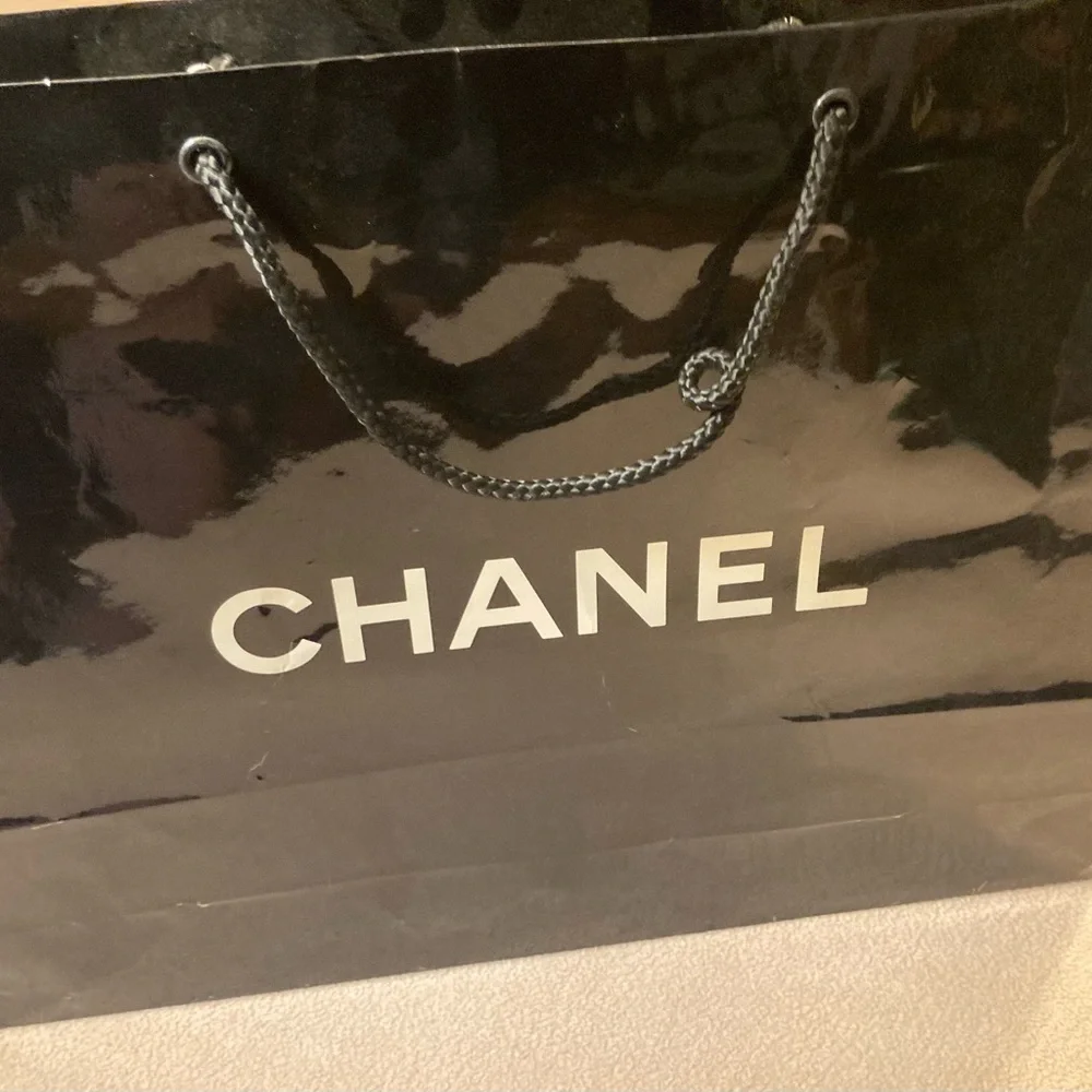 Chanel, high gloss glazed paper bag in black with White Chanel block letters