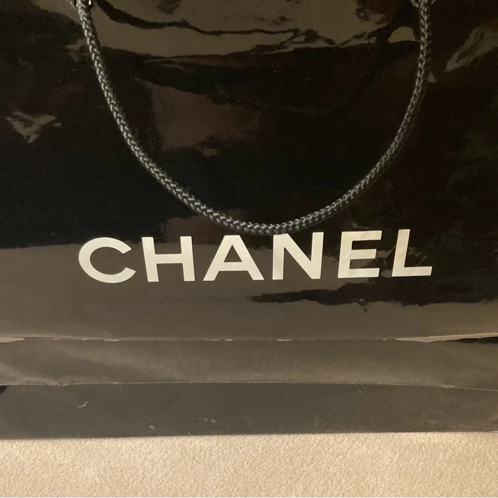 Chanel, high gloss glazed paper bag in black with White Chanel block letters