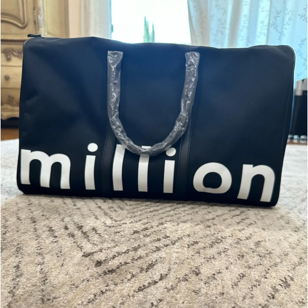 Paco rabanne 1 million black duffel bag. NWT.