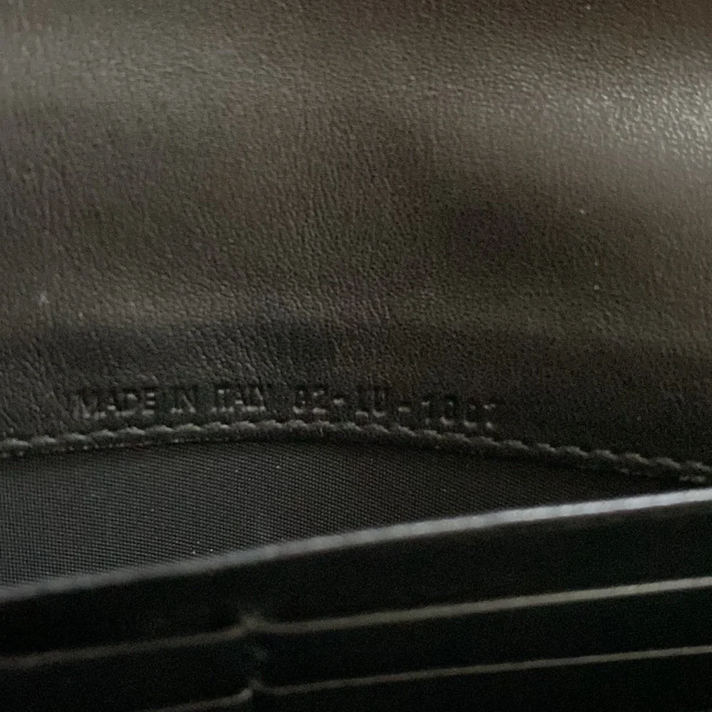 Christian dior oblique design patent leather long wallet.