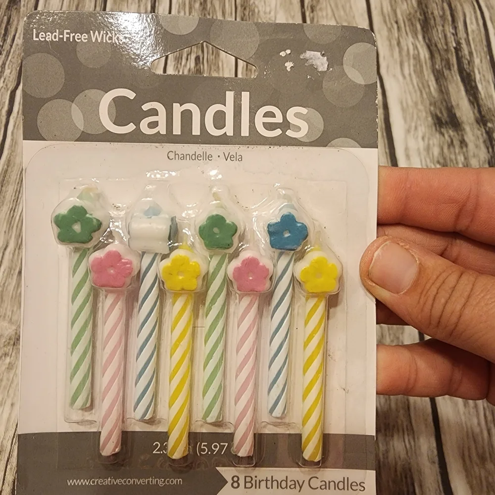 Flower candles, set of 8. Green, yellow, pink and blue pastels.
