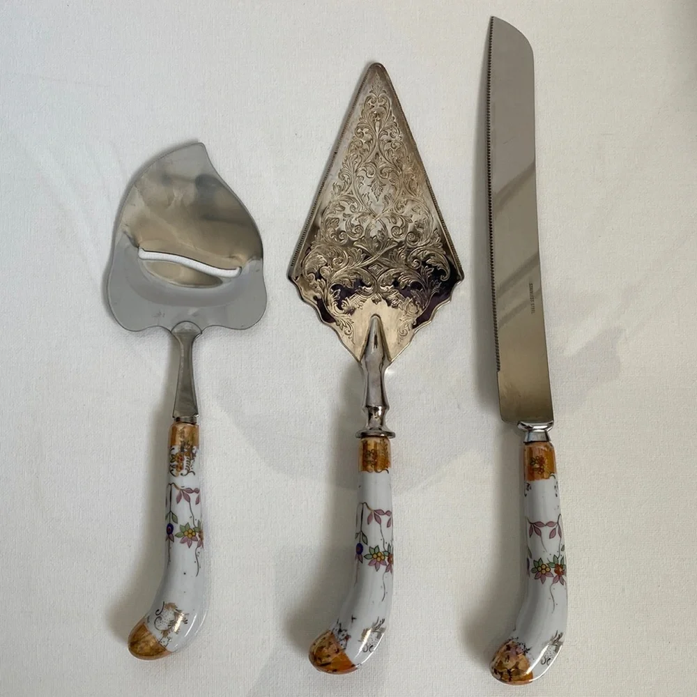 Lovely set of vintage serve ware with floral porcelain handles