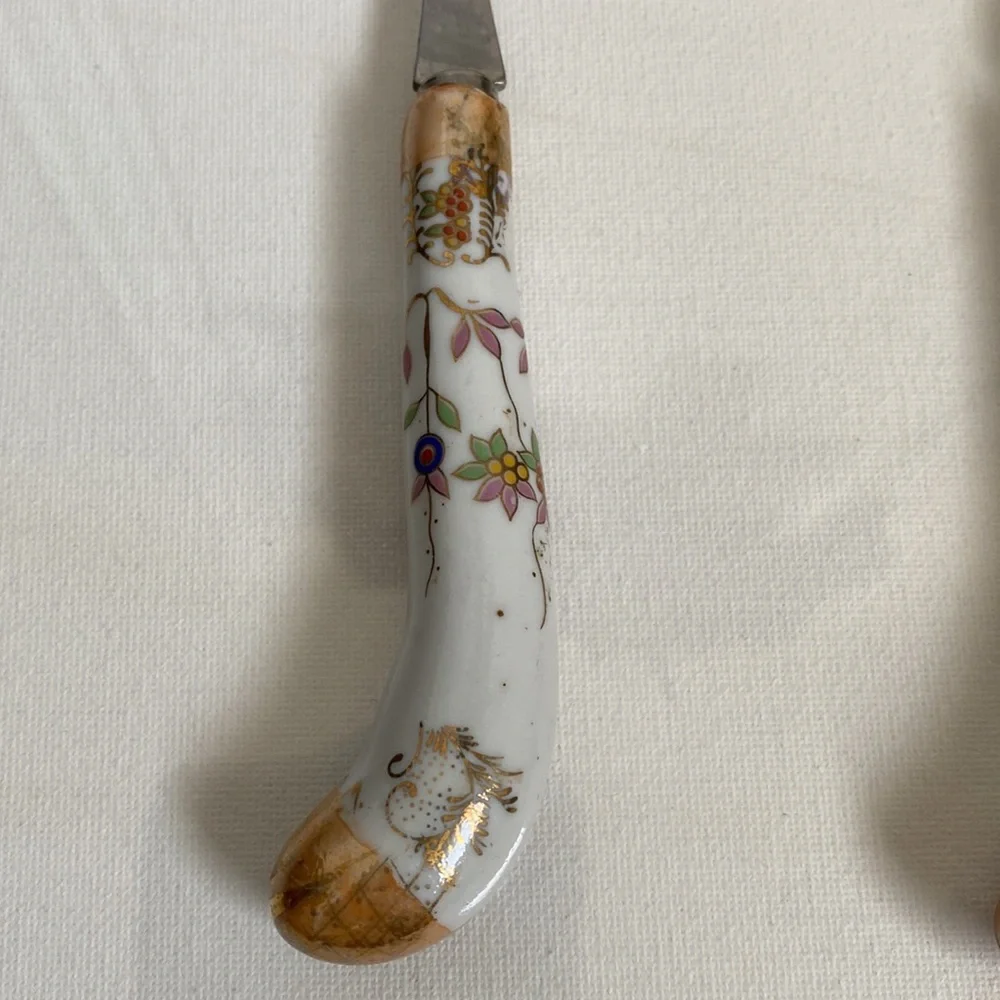 Lovely set of vintage serve ware with floral porcelain handles