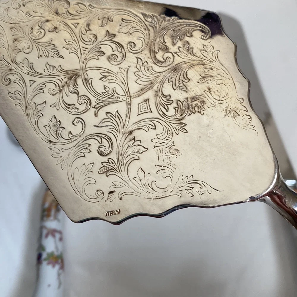Lovely set of vintage serve ware with floral porcelain handles