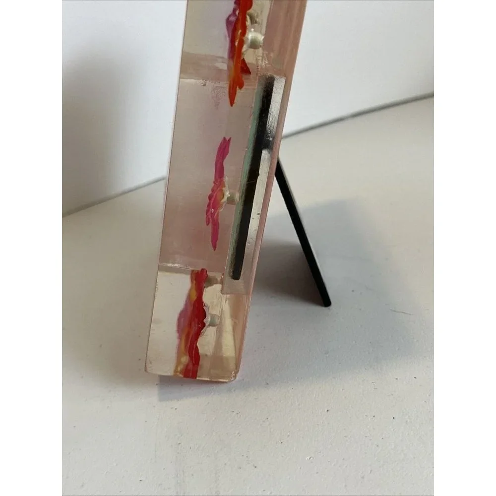 Habitat scratches lucite