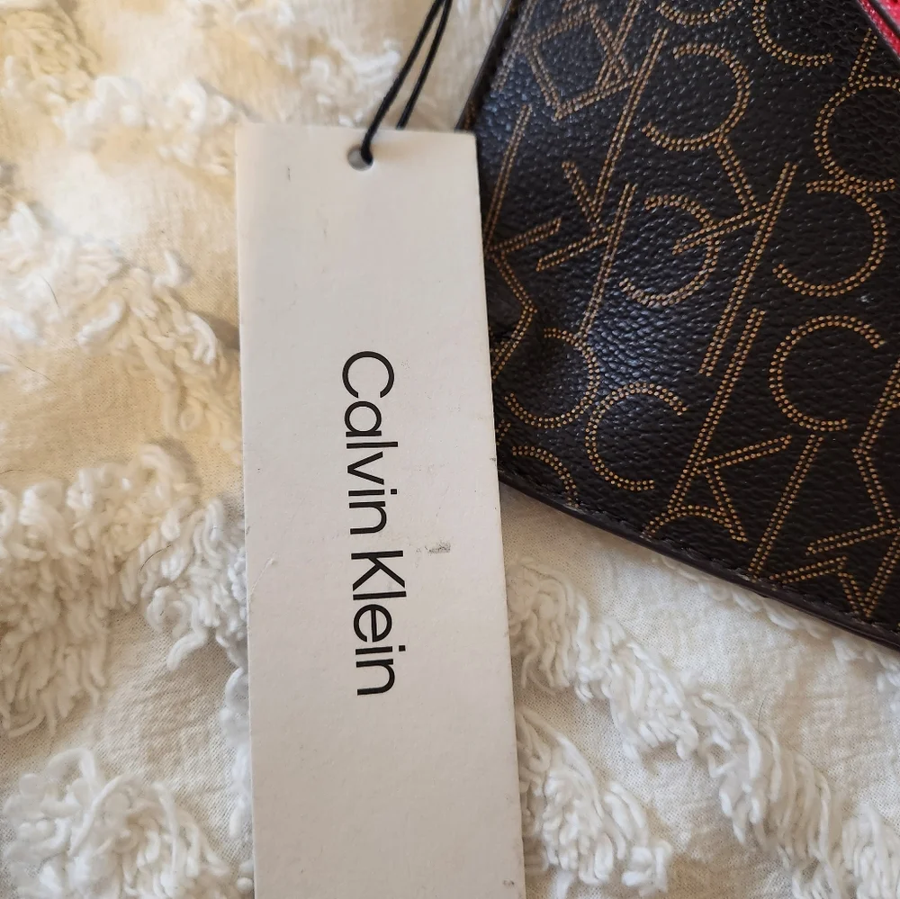 NWT CALVIN KLEIN wristlet.  GREAT COLORS.   10 X 6.5 ORIGINAL PACKING