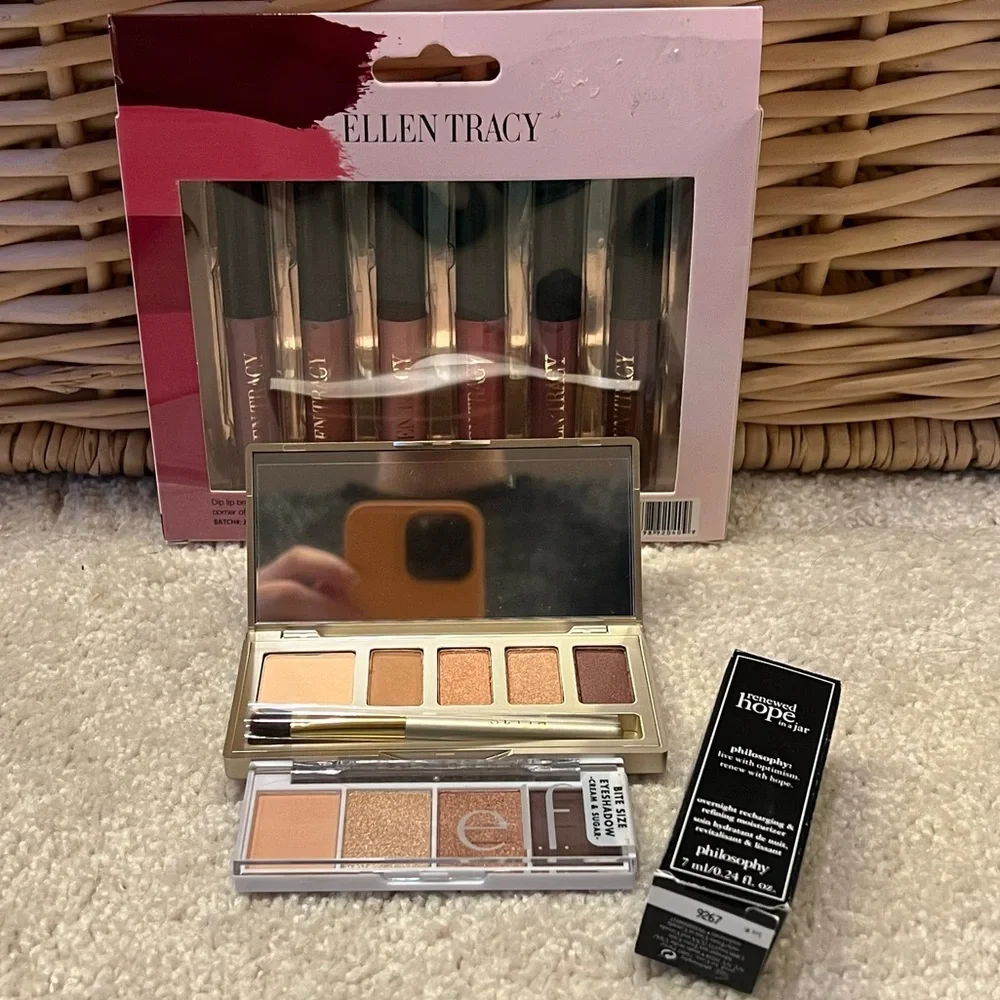 Assortment Of Makeup Products Lip Gloss Eye Shadow