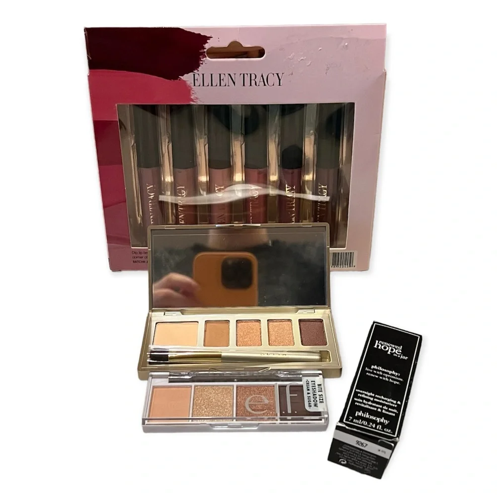Assortment Of Makeup Products Lip Gloss Eye Shadow