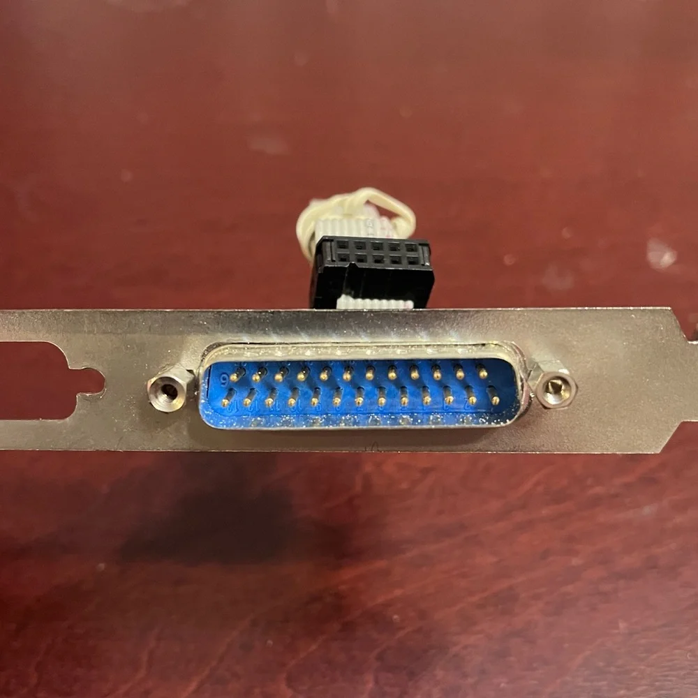 Misc computer slot connections and screws.