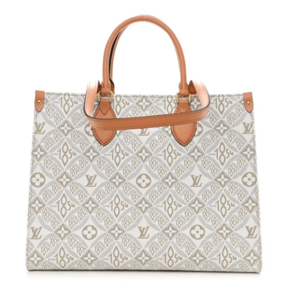 Louis Vuitton Jacquard 1854 Onthego MM in Creme
