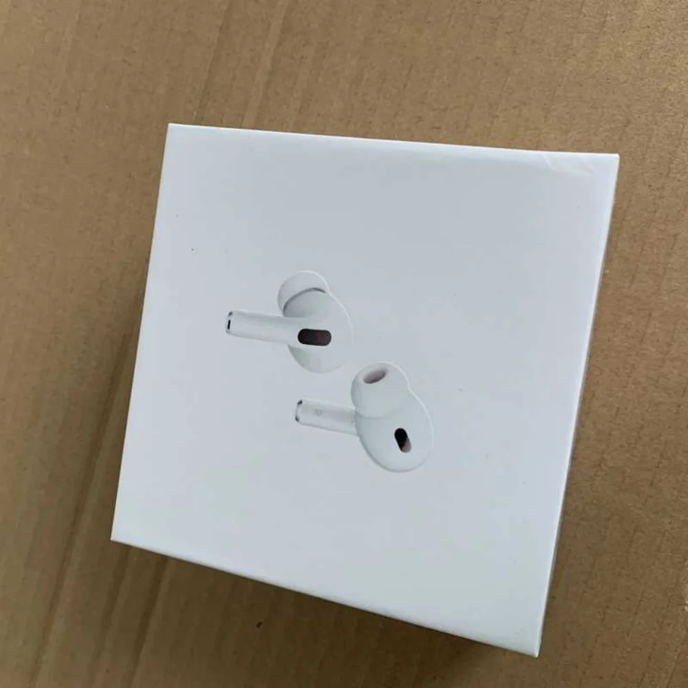 Brand new Apple earphones 2nd generation & wireless charging case