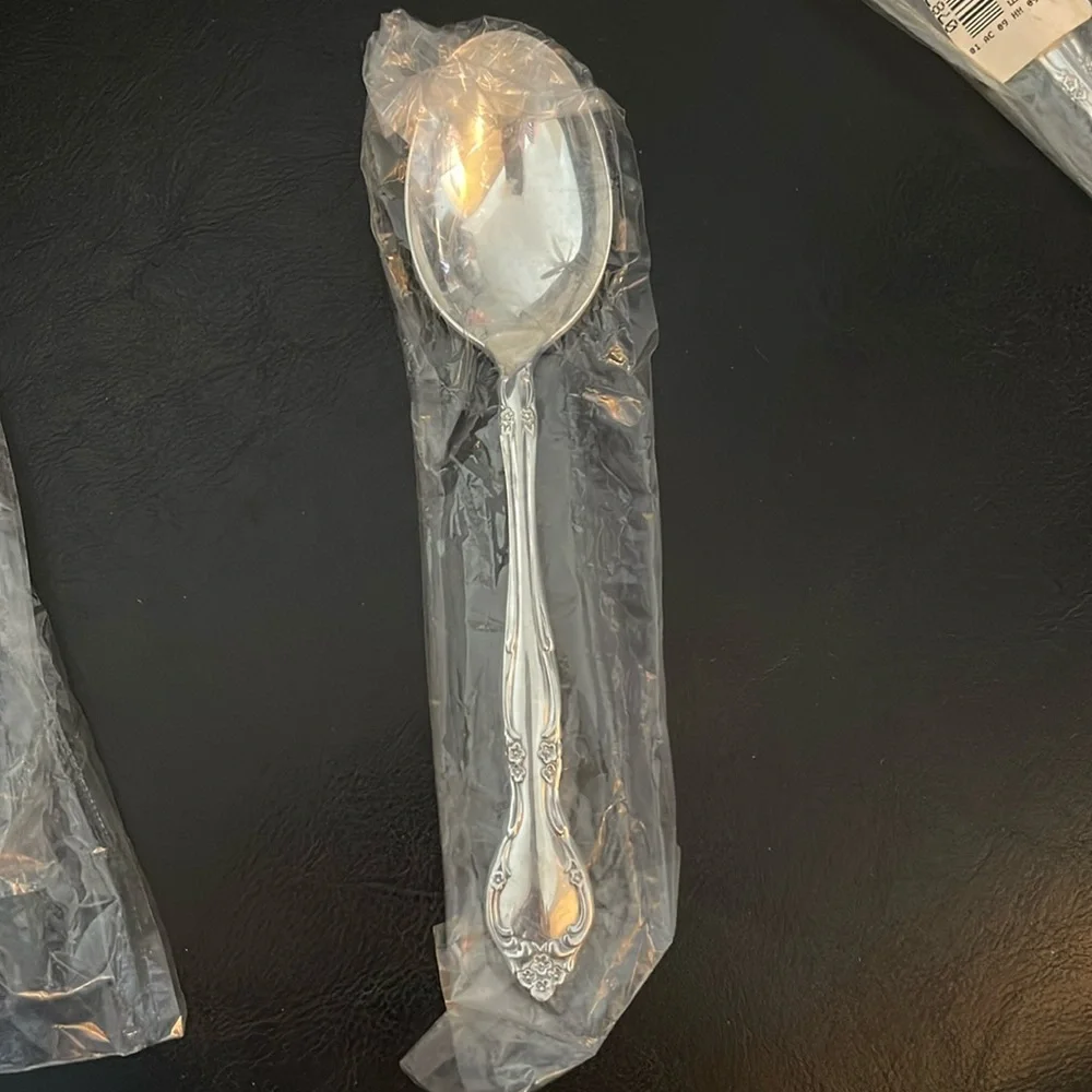 2 New Oneida Affection Soup Spoons
