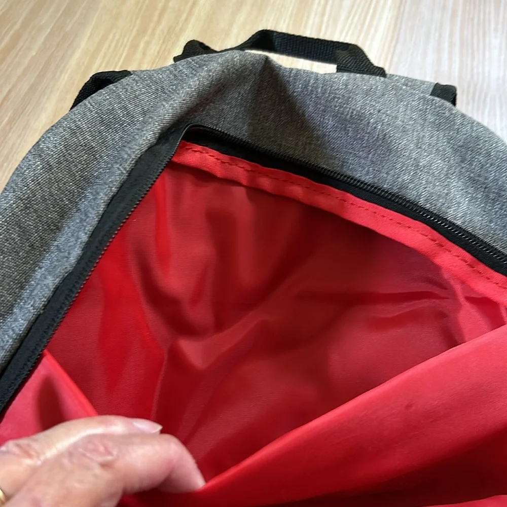 Puma backpack black red gray laptop compartment pockets, front zip pocket, logo