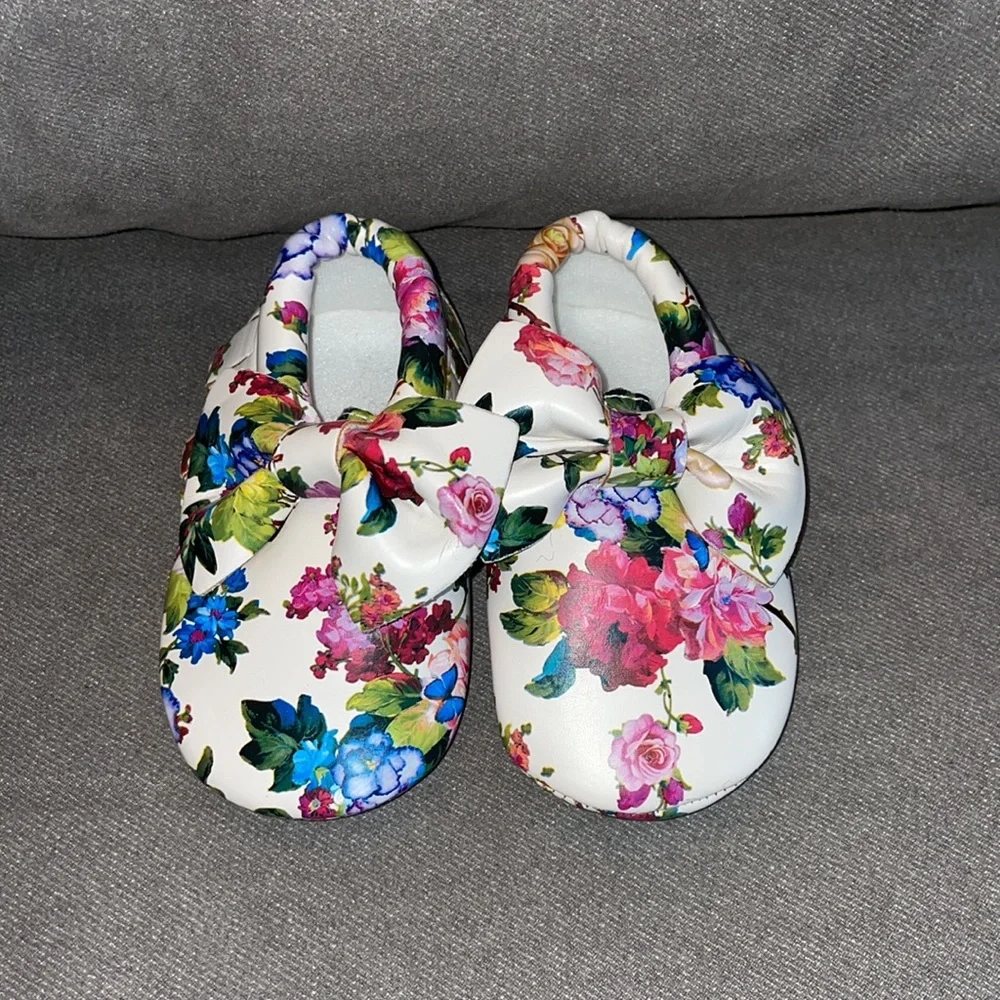 NWT.  Girls floral leather moccasins.  18-24 months.  Size 5