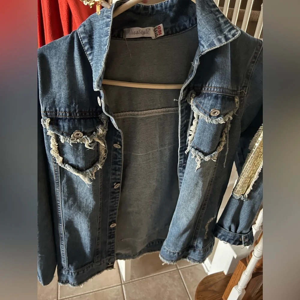 Denim jacket. Embroidered and sequined. Super cute. New without tags!
