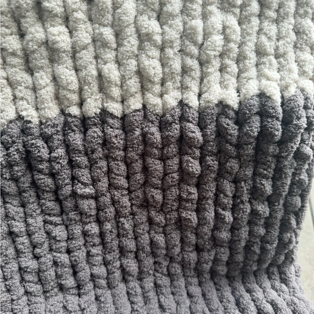 Hand knitting blankets , baby blanket’s dog beds , Cat beds and more