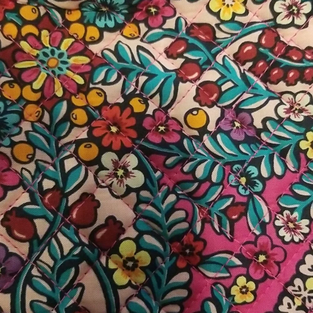 Pink Vera Bradley makeup bag.