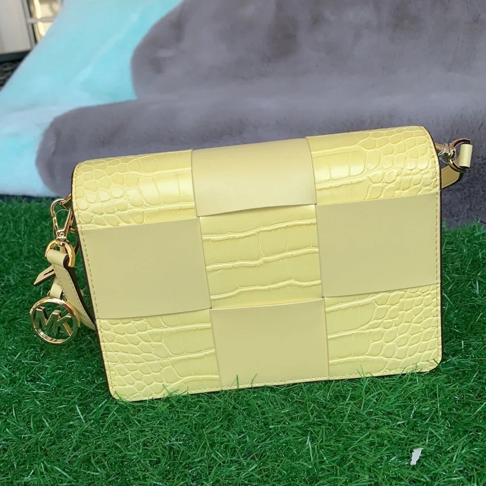 Michael Kors Mercer Sm clutch XBODY Buttercup