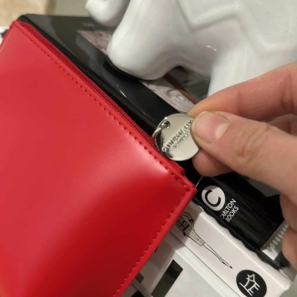 Givenchy make up bag and lipstick