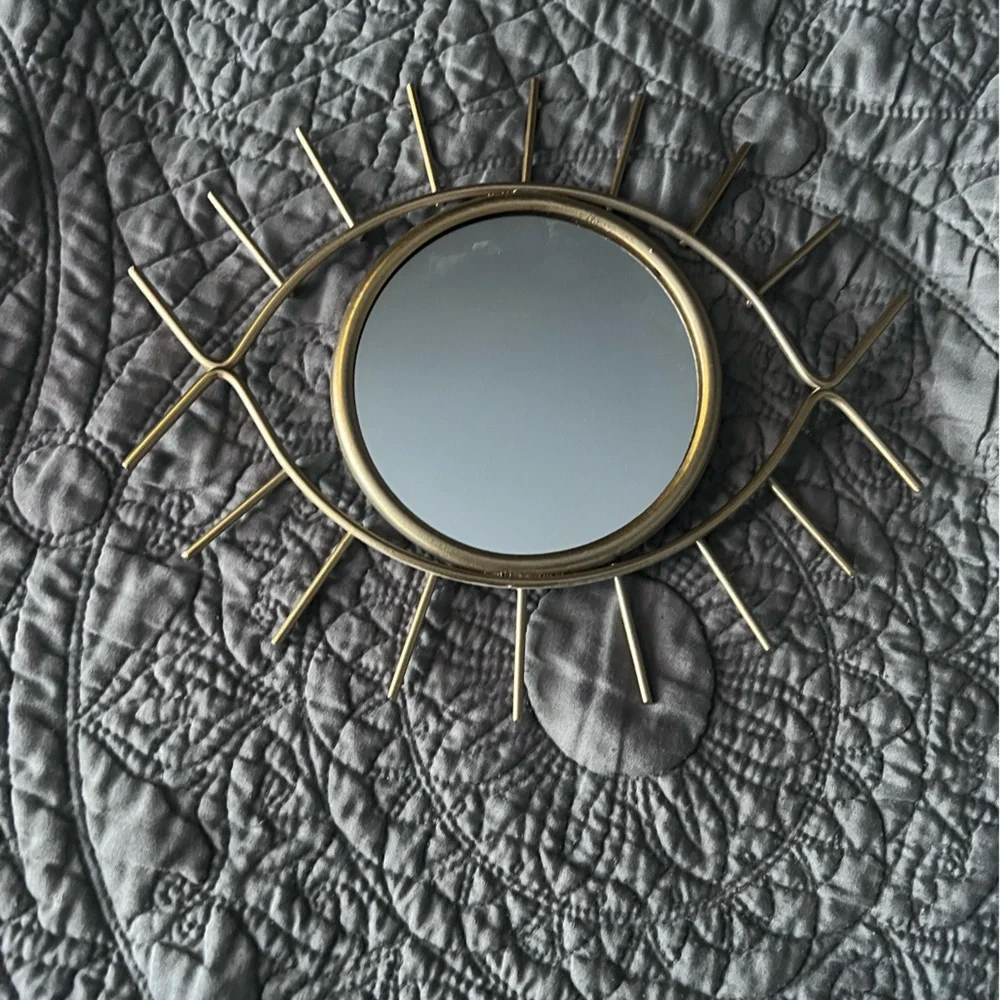 Like new gold metal eye mirror