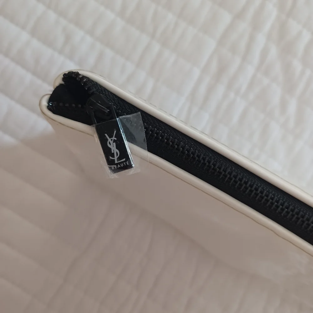 Yves Saint Laurent excellent used