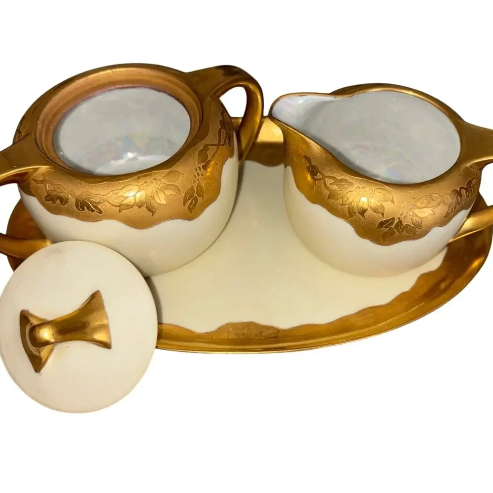 Vintage gold porcelain creamer and sugar by Thomas Bavaria beautiful pieces