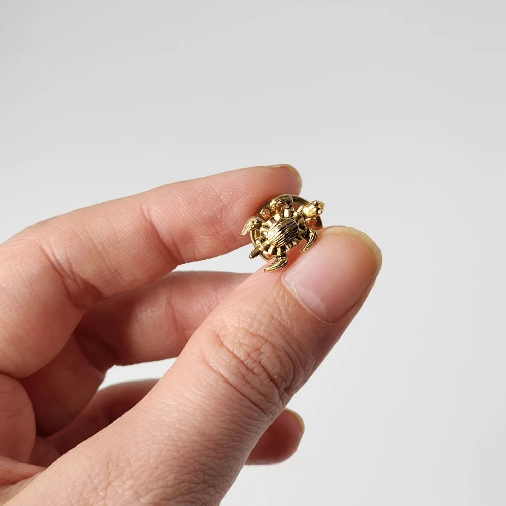 N/A tiny goldtone