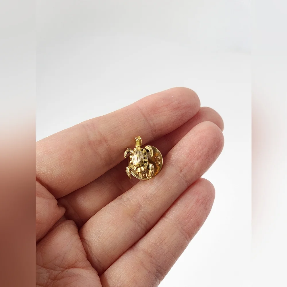 N/A tiny goldtone