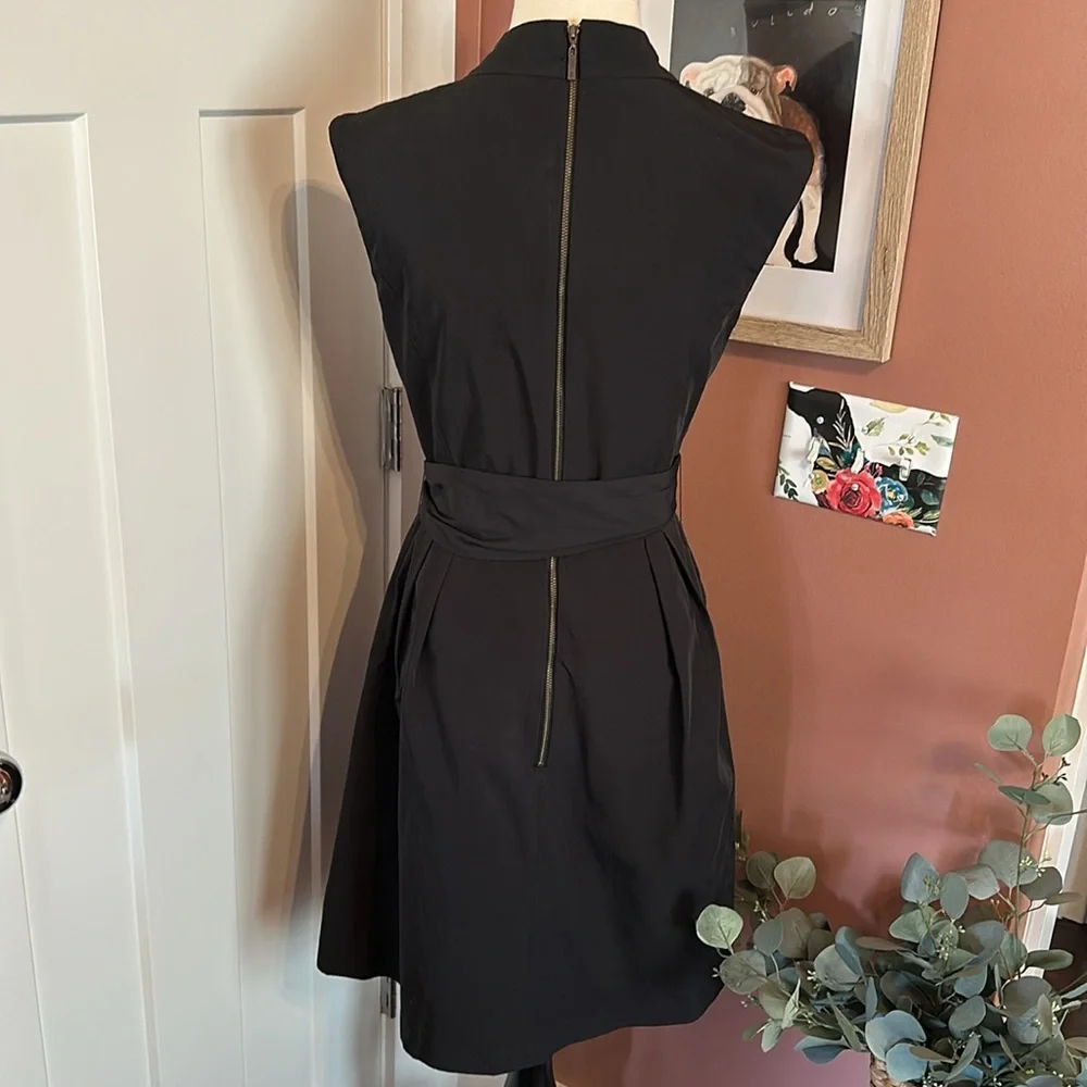 CUE made in Australia black origami faux wrap cap sleeve 6 mini pockets dress