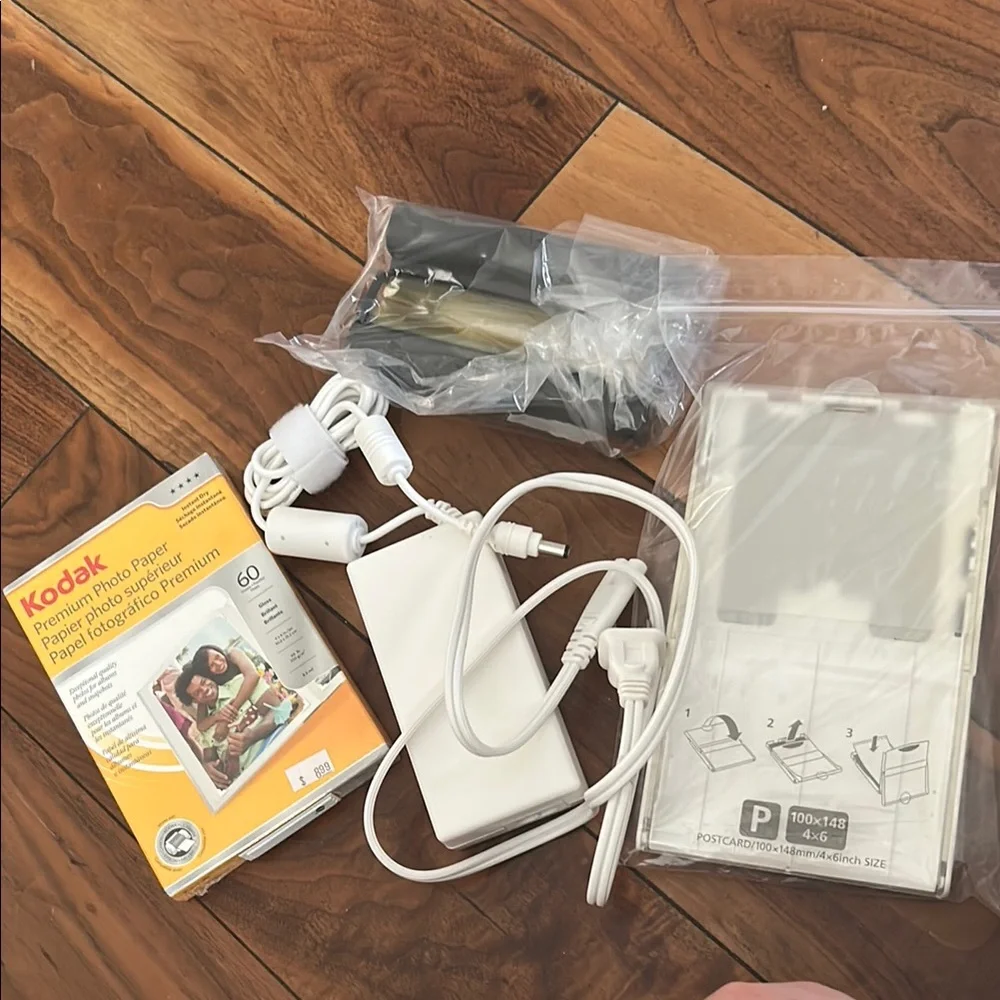 Canon Selphy CP780 Compact Photo Printer - Blue w/ Color Ink and Paper Bundle