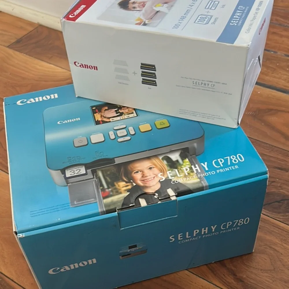 Canon Selphy CP780 Compact Photo Printer - Blue w/ Color Ink and Paper Bundle