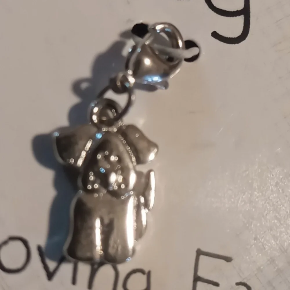 puppy charms adorn your