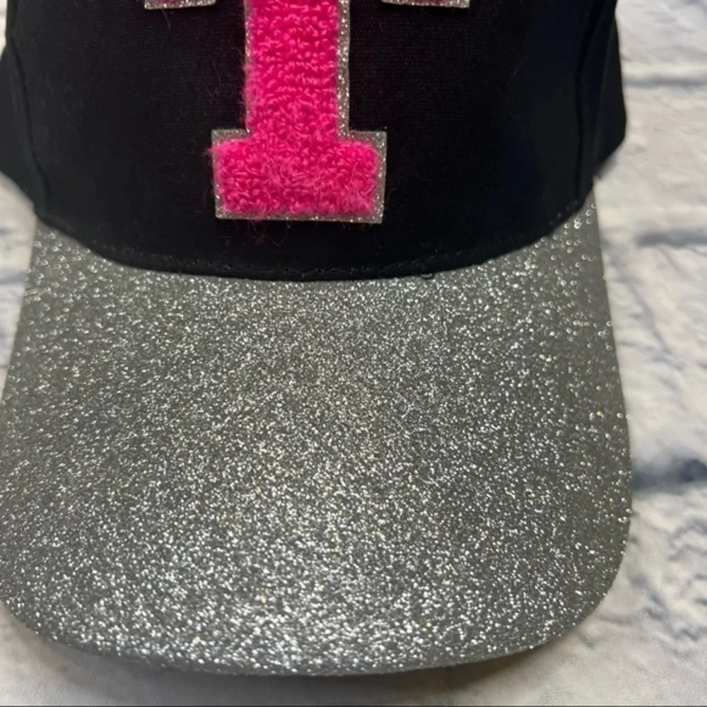 Justice glitter hat with the letter 