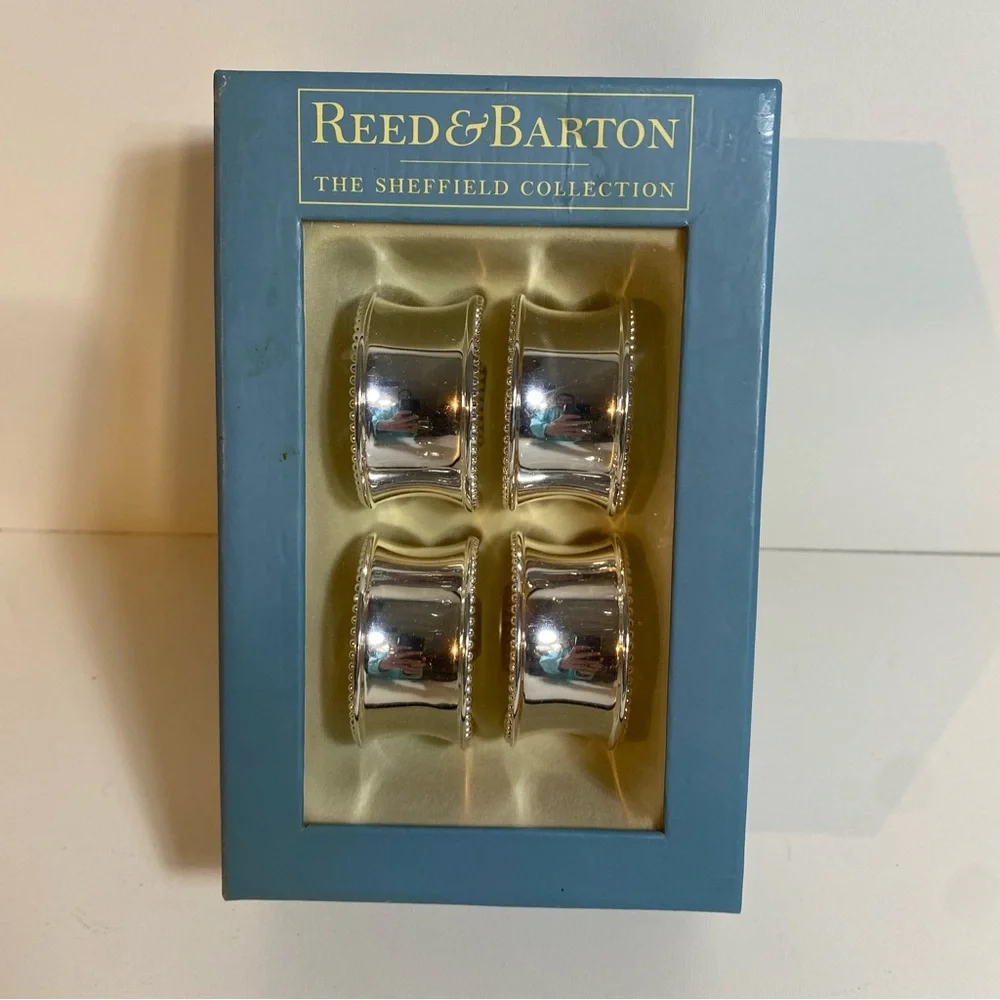 NIB Set Of 4 Reed & Barton Silver Plate Napkin Rings