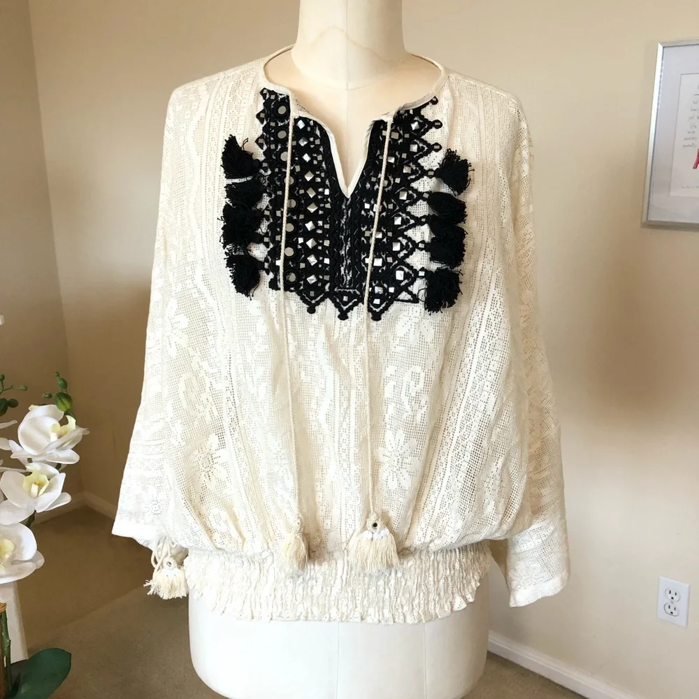 Anthropologie neck brand tassel