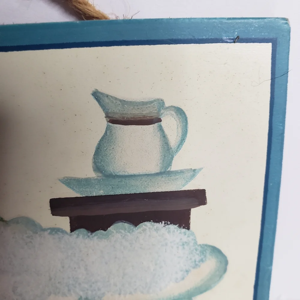 Decorative sign for a bathroom. 221