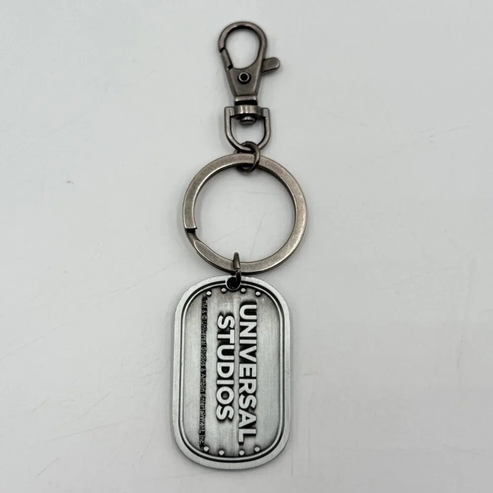 Universal Studios Jurassic World T-Rex Dinosaur Metal Keychain Name Jorge