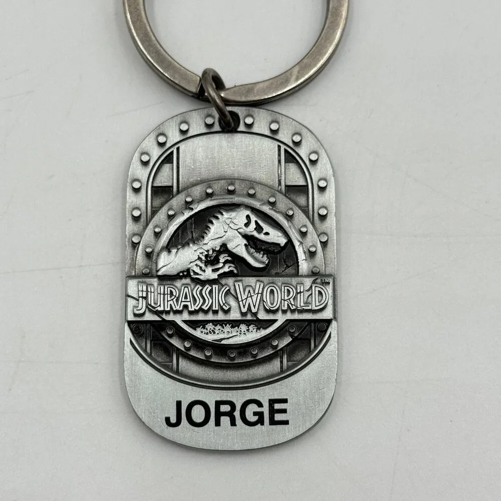 Universal Studios Jurassic World T-Rex Dinosaur Metal Keychain Name Jorge
