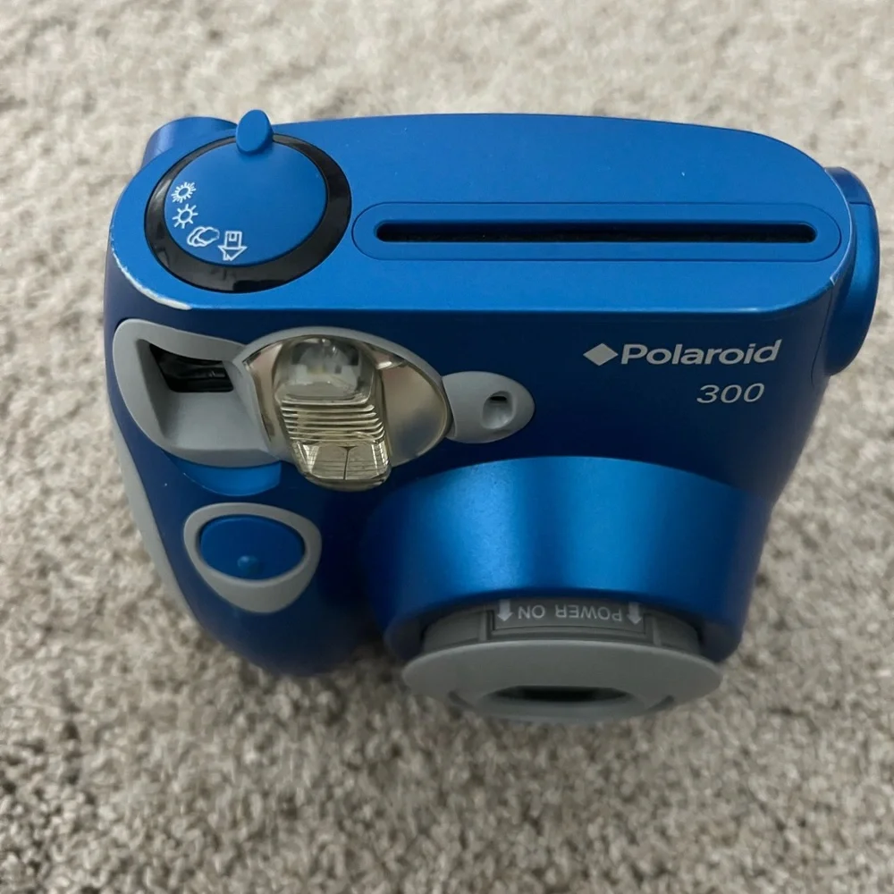 Polaroid experience charm