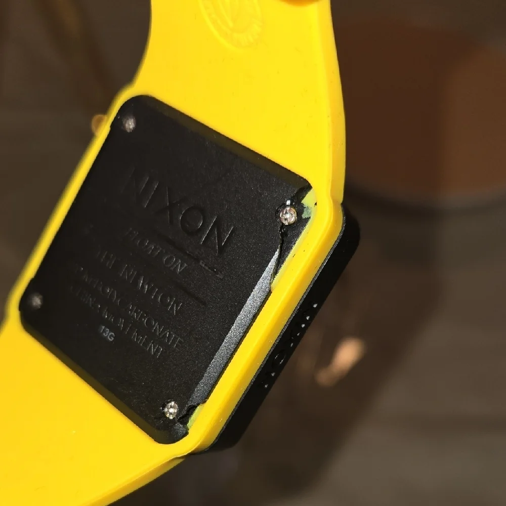 Nixon yellow smartwatch