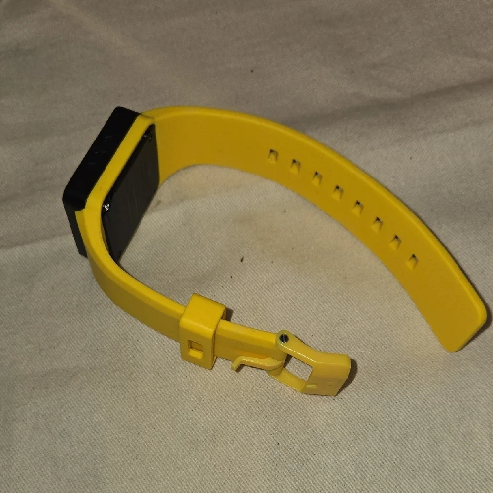 Nixon yellow smartwatch