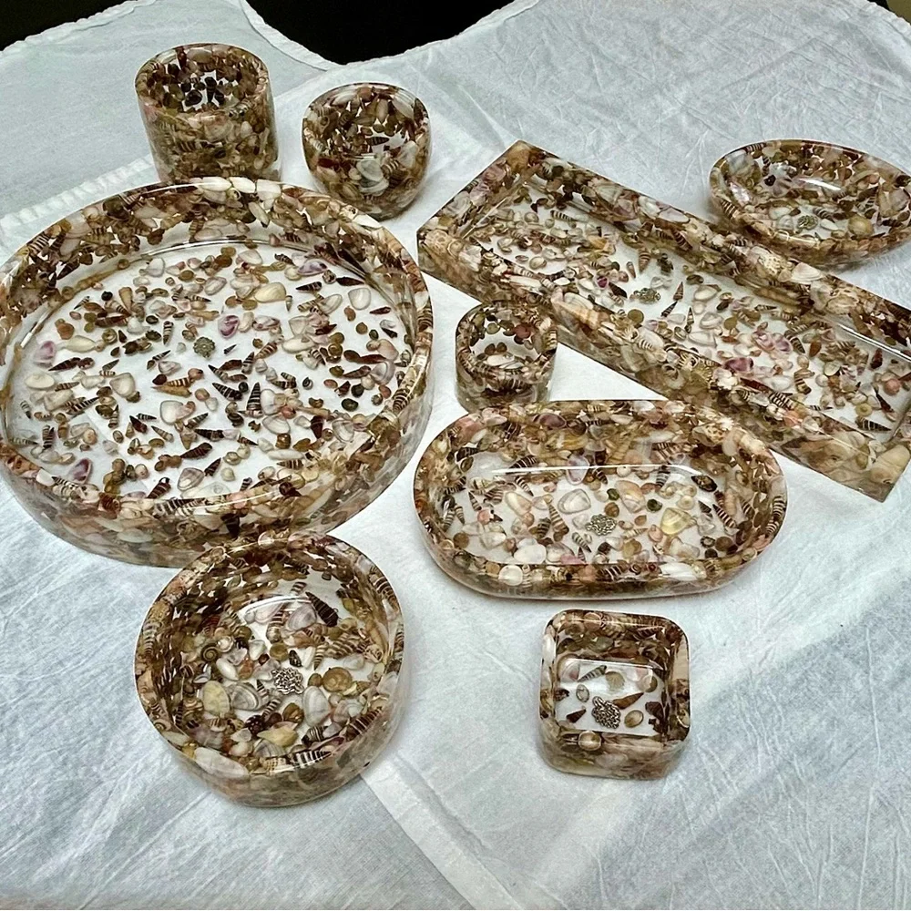 Shell and resin contemporary functional art pieces for the vanity or office