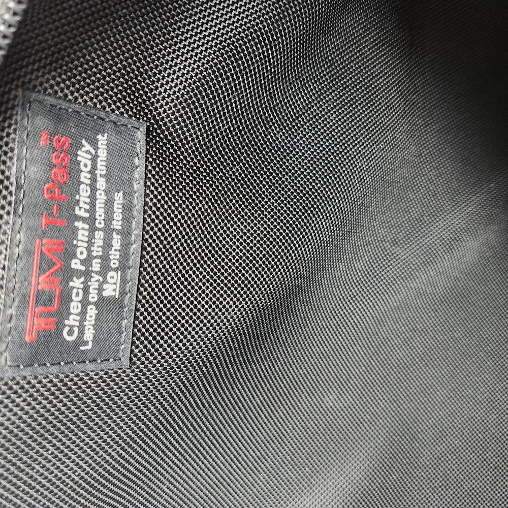 Tumi black briefcase